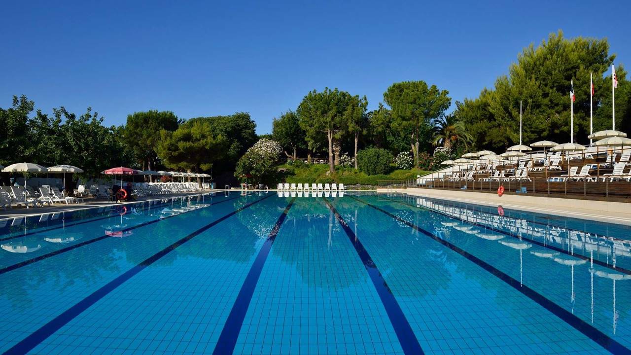 uh naxosbeach sicilia giardininaxos olympic swimmingpool2 2000x1335 0221ca69 cad6 4154 ad59 ce1a537e25c0 wide